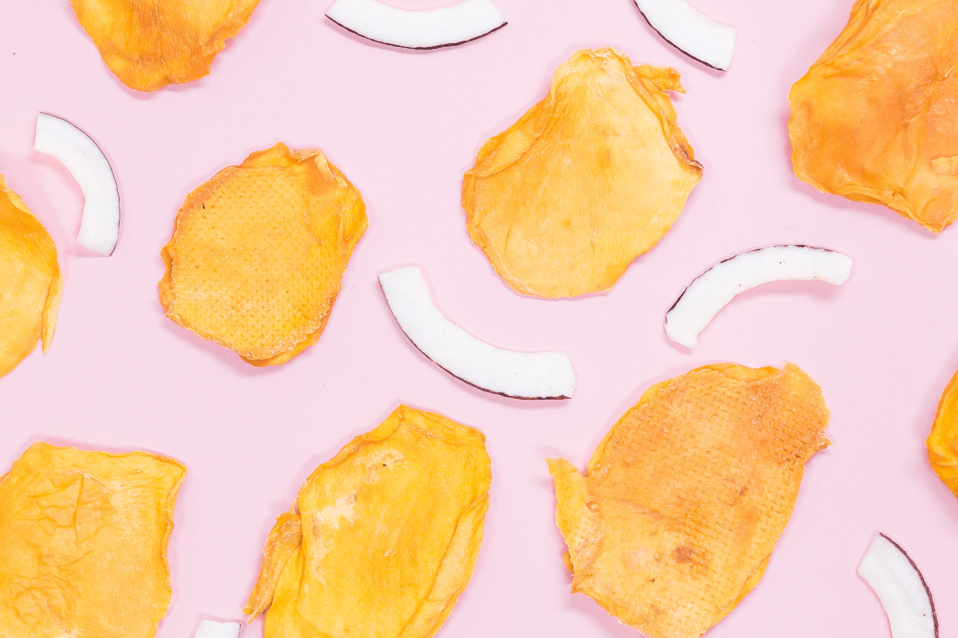 dried fruit on a pink background