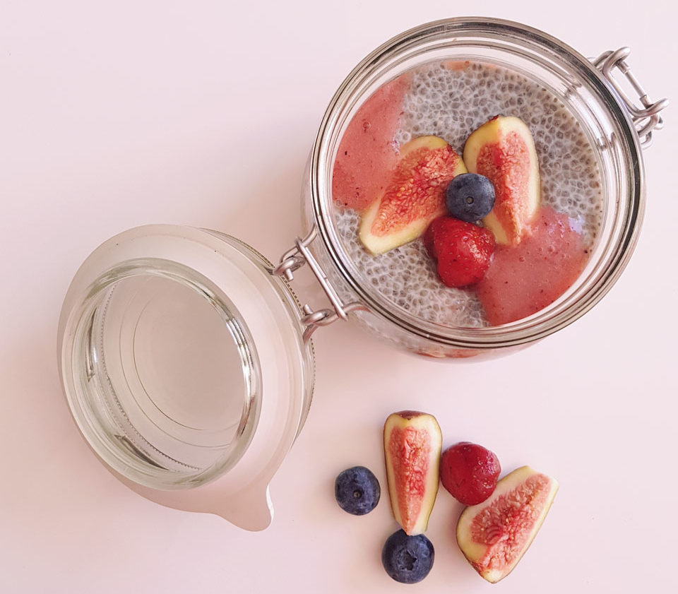 jar of chia seed pudding with fresh fruit on top