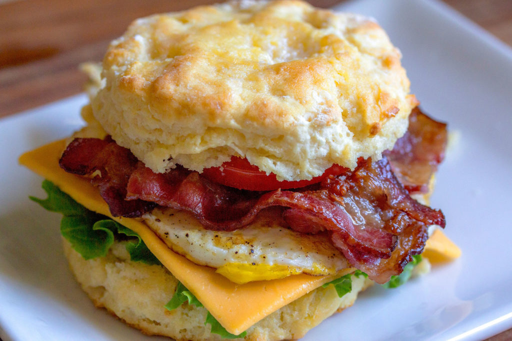 breakfast sandwich with egg, bacon and cheese