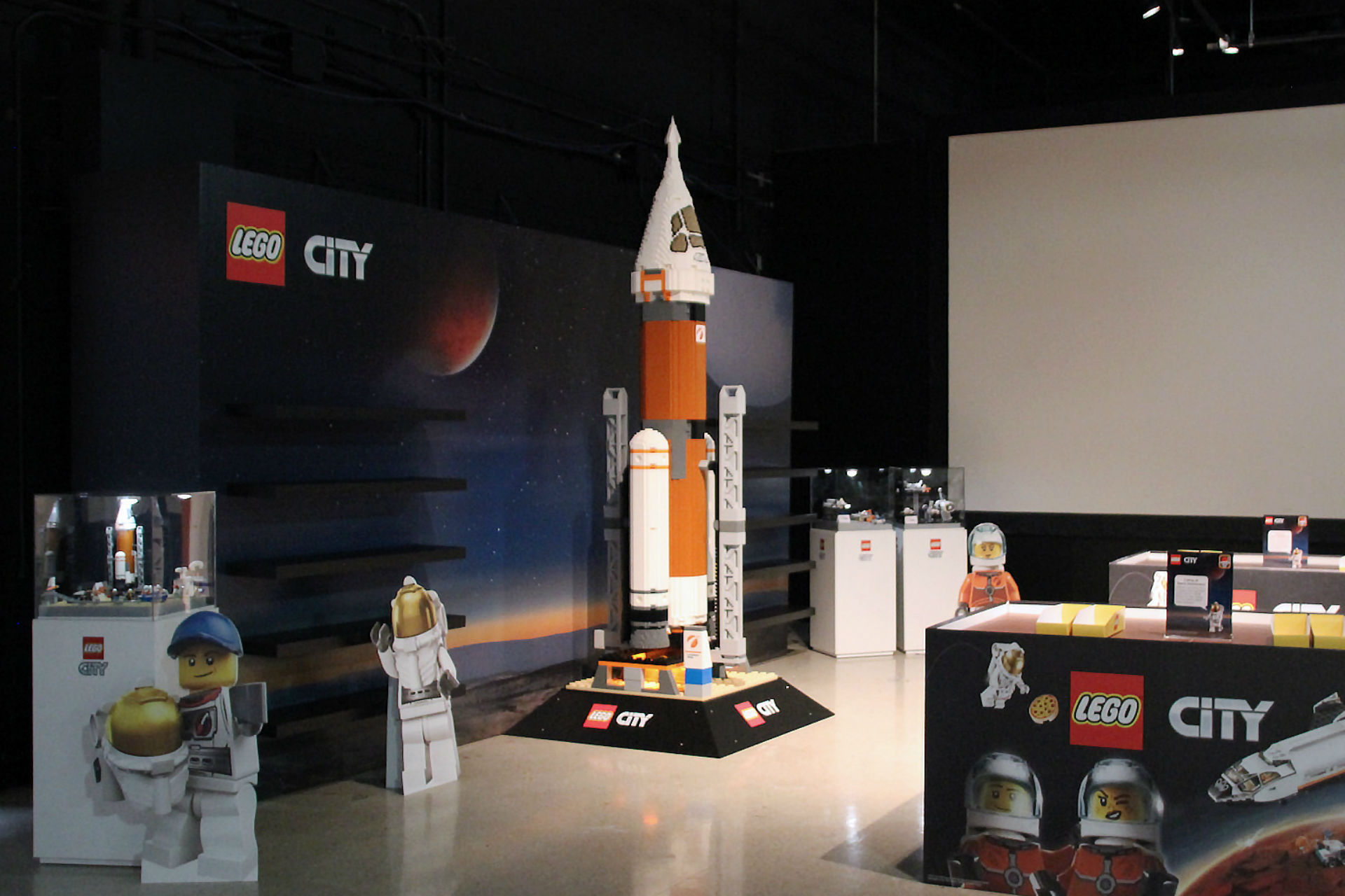 lego rocket ship in a display room