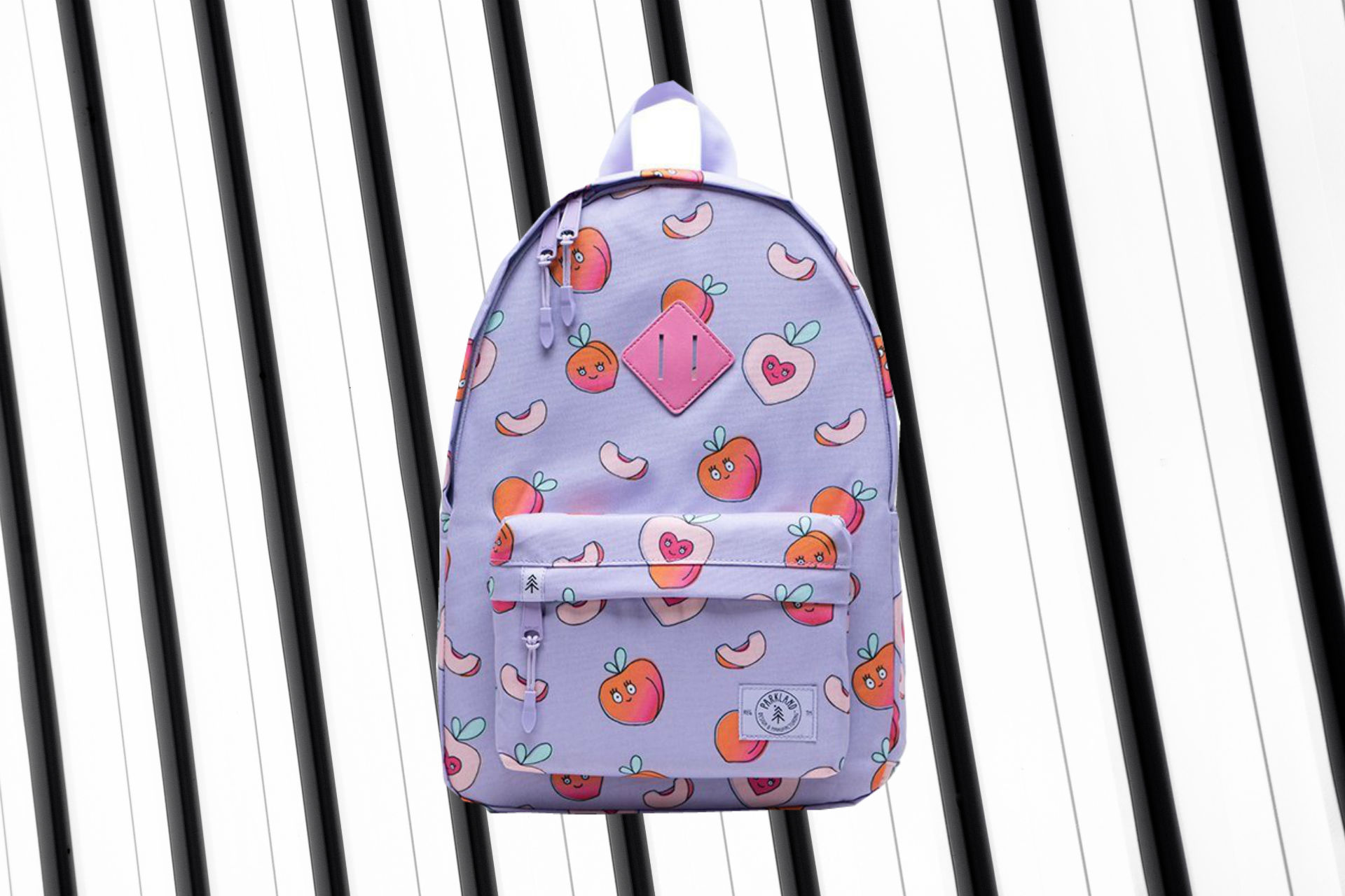 purple backpack on a black and white background