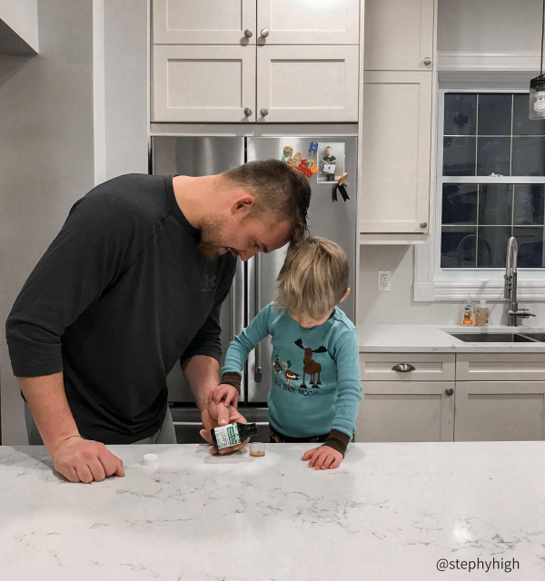 Dad and son with homeocan syrup