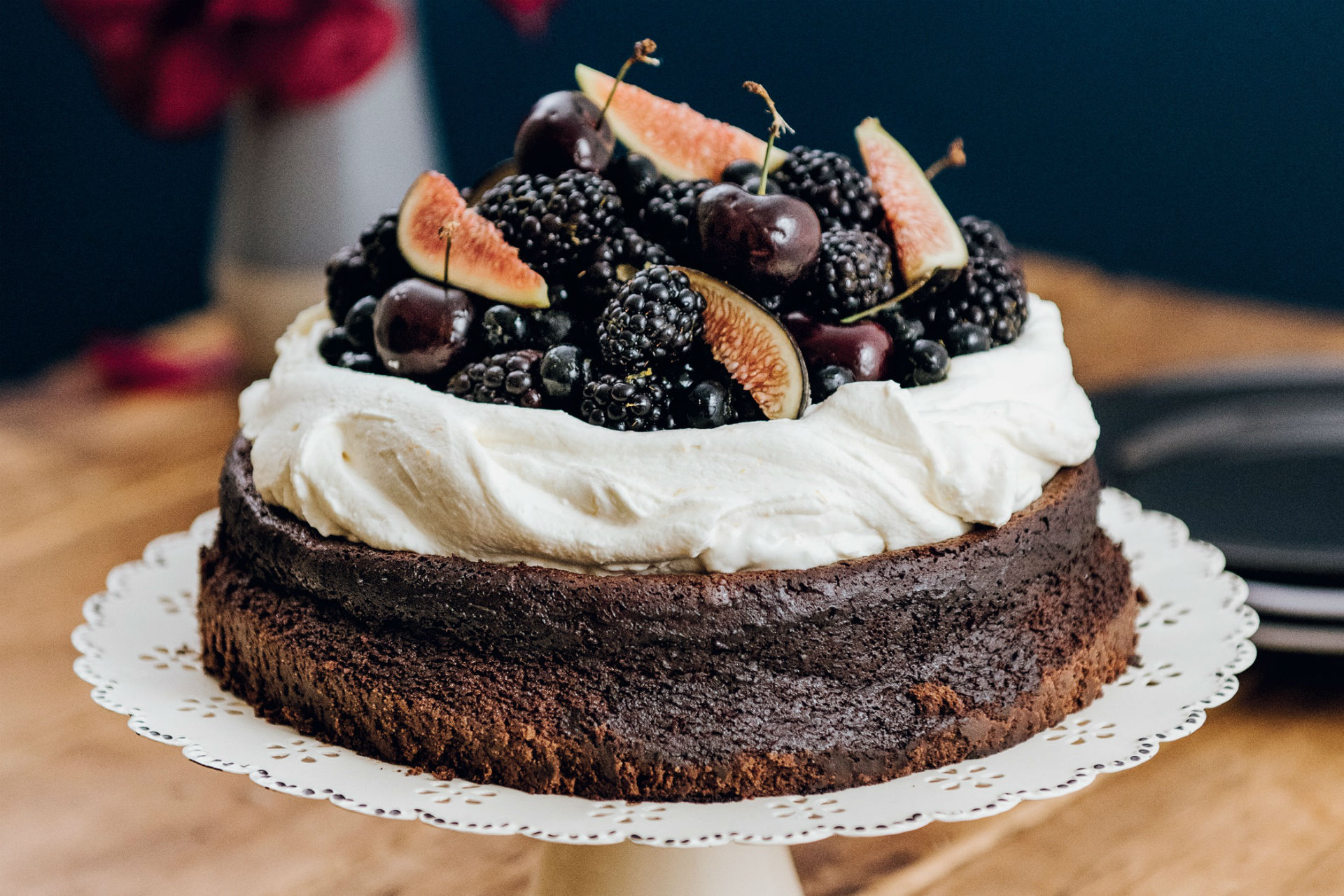 Chocolate cake with whipped cream and fresh fruit