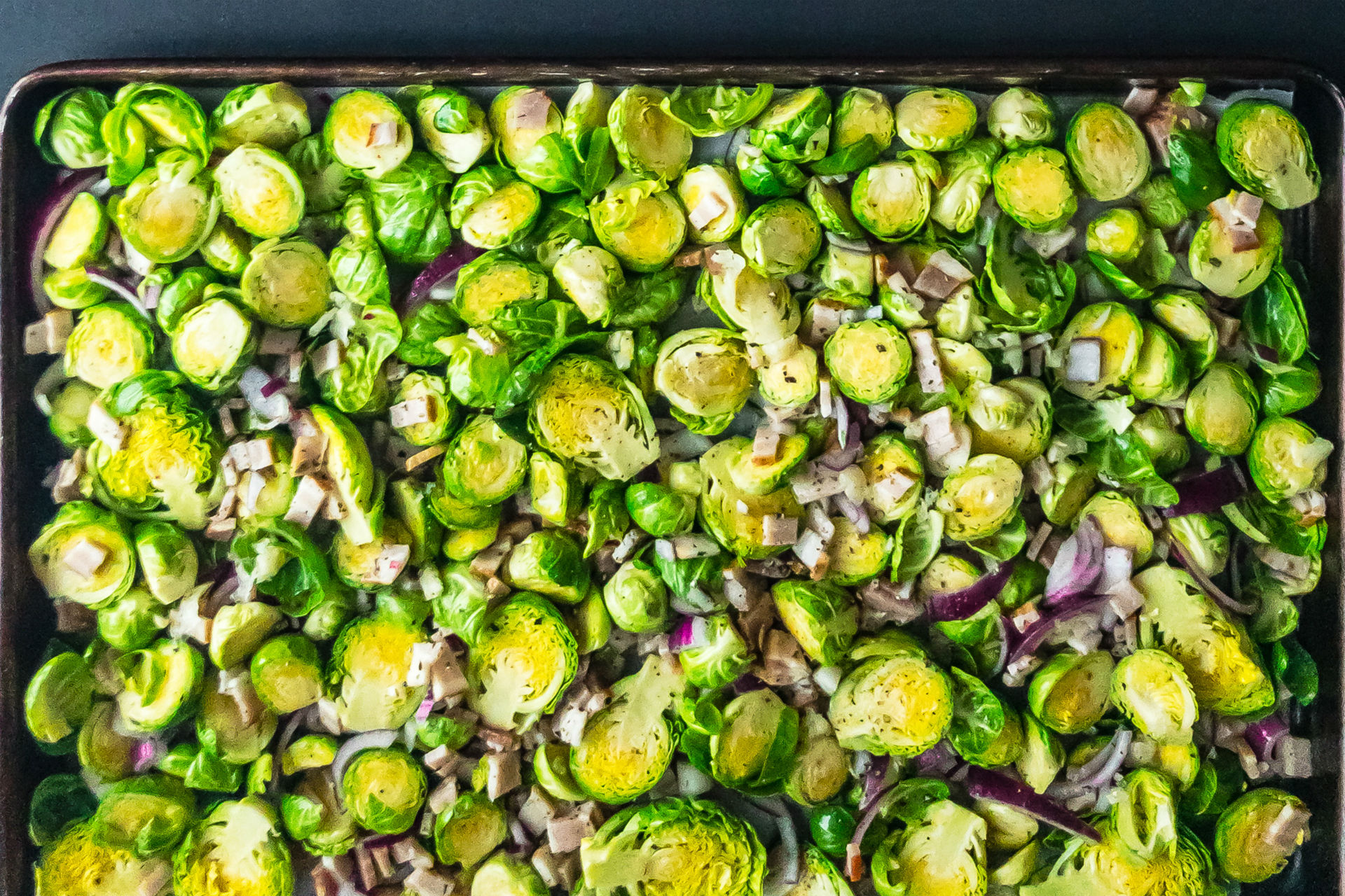 tray of brussels sprouts with onion