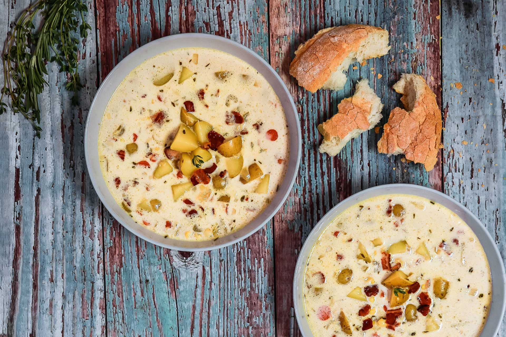 corn chowder with bread on the side