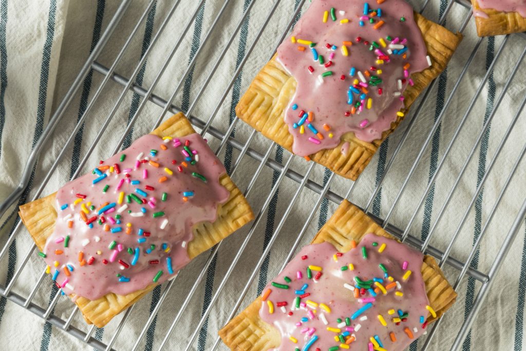 homemade pop tarts with icing on a cooling rack