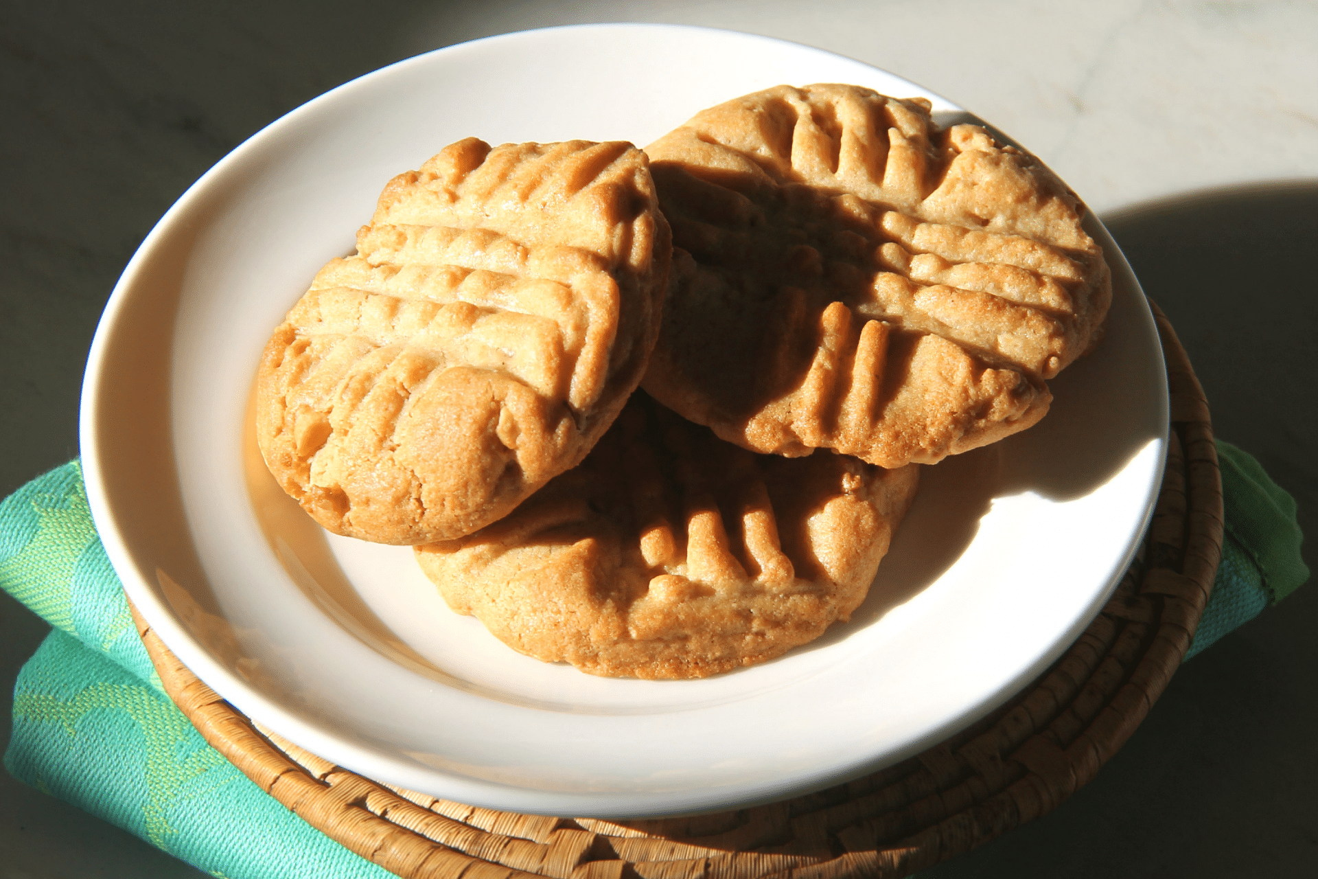 stack of peanut butter cookies on a plate