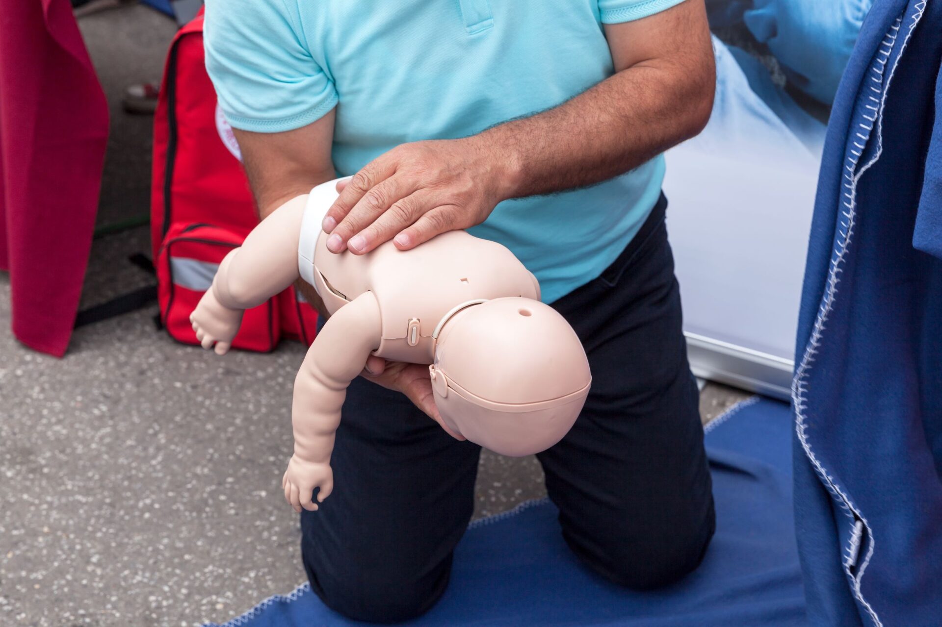 choking instruction on baby doll