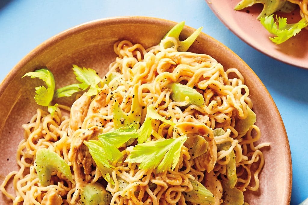 plate of noodles with chicken and celery in recipes using rotisserie chicken