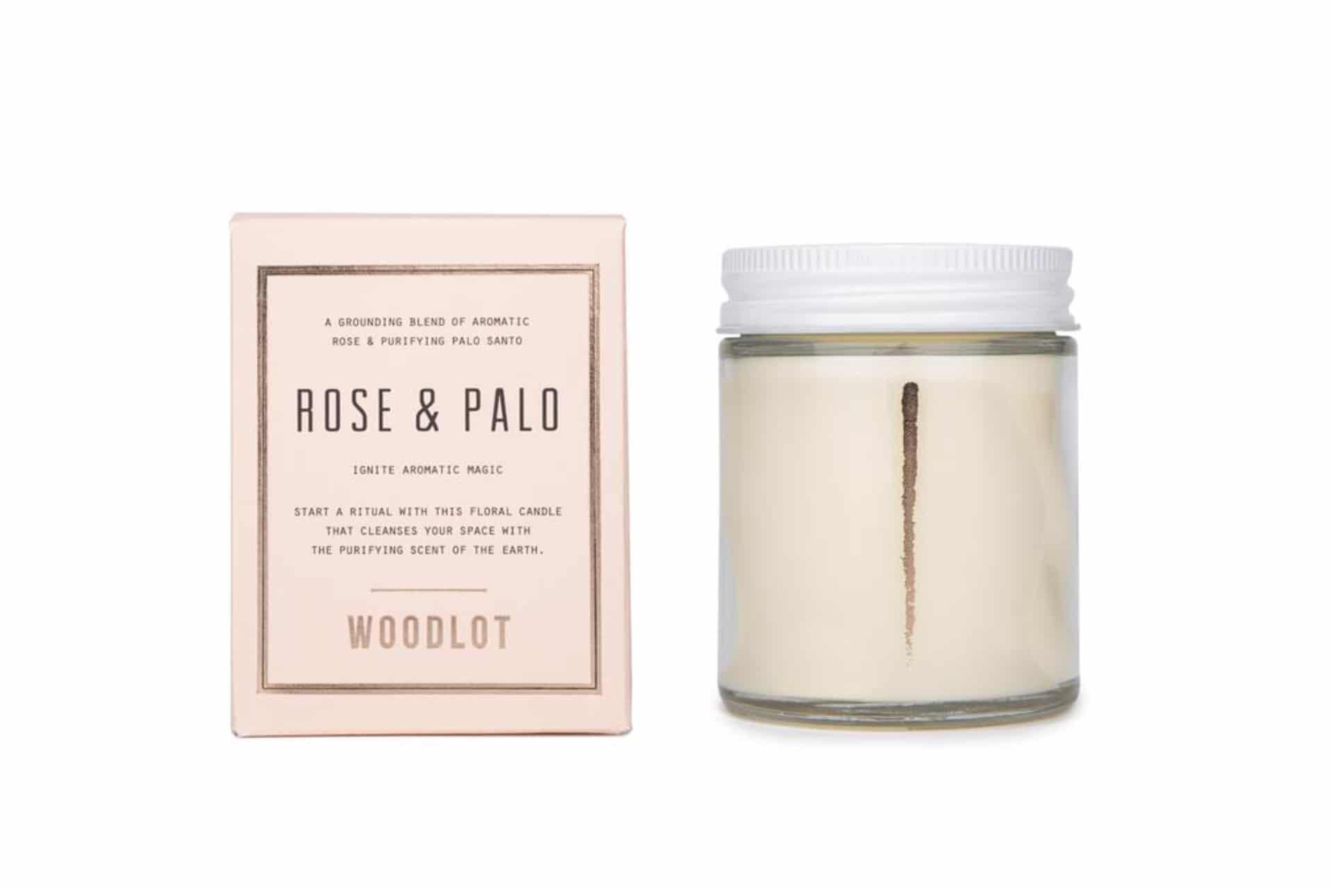 jar candle with box beside it in pale pink