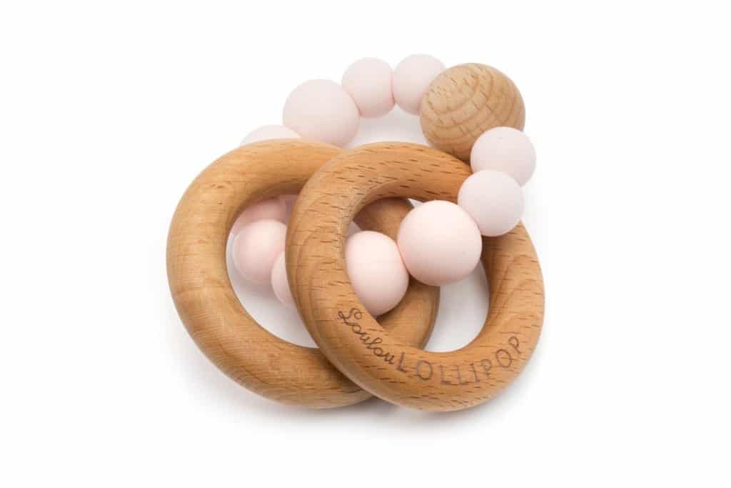 Bubble Silicone And Wood Teether in pinks and natural wood