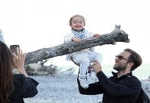 5 Tips for Taking Awesome Pictures with Your Phone Parents taking picture of child on phone