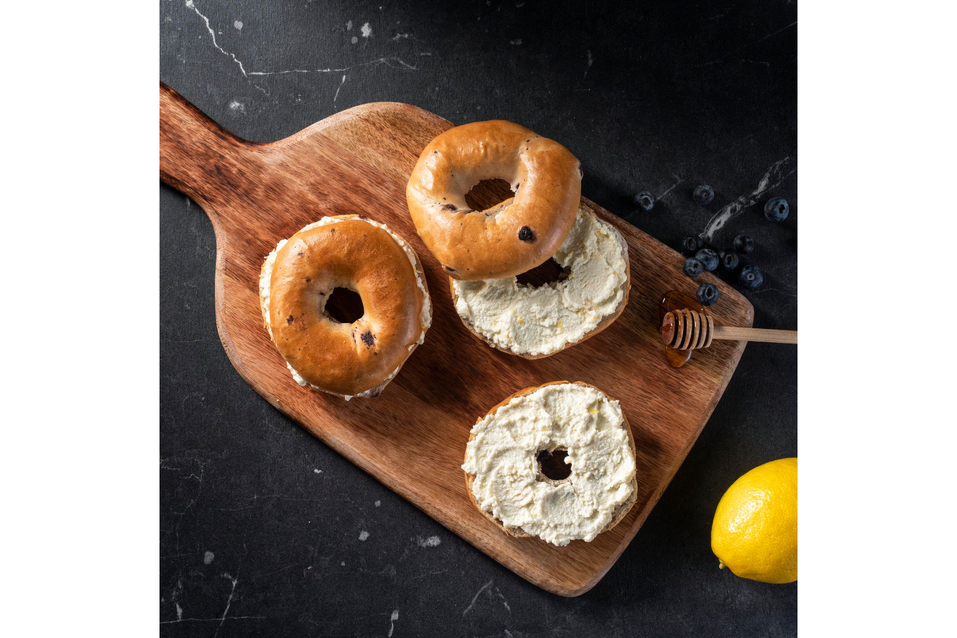 Blueberry bagel with lemon and ricotta