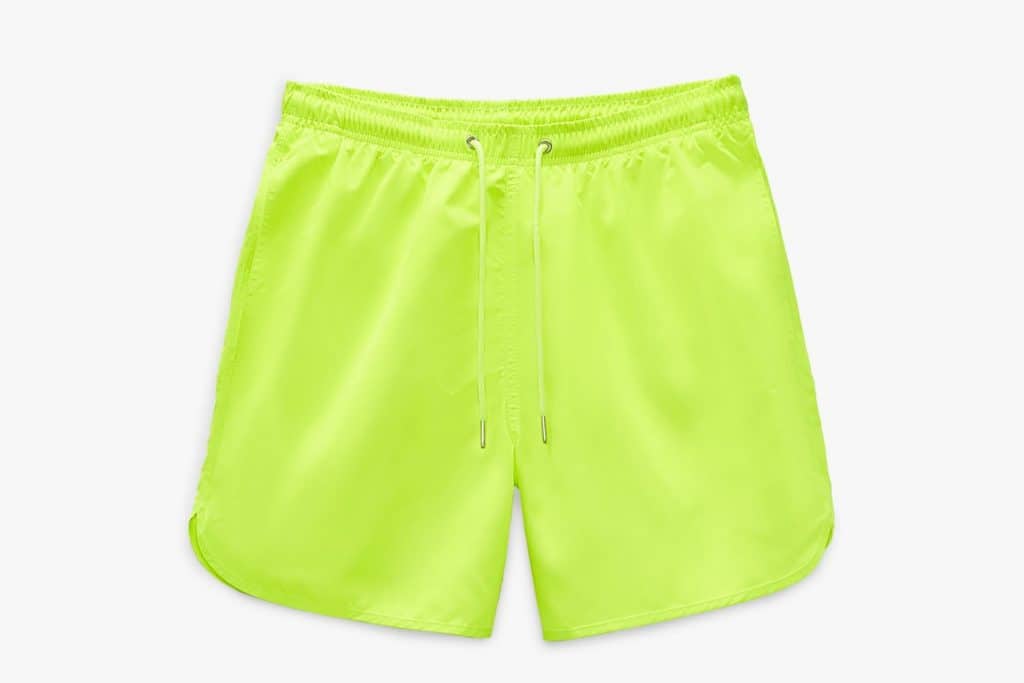 Neon green swim trunks with a draw string