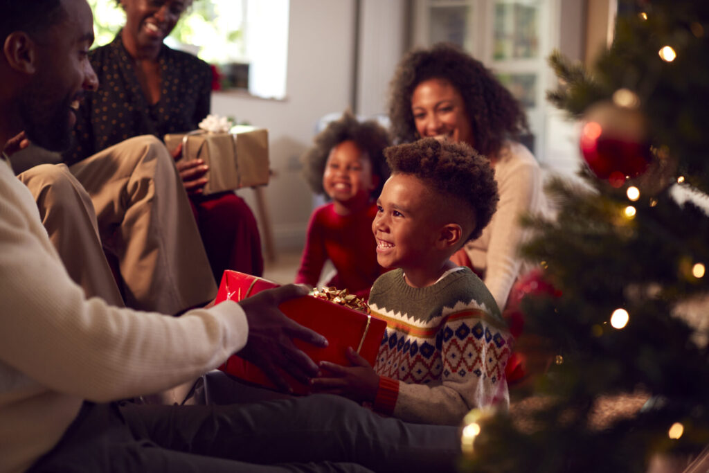 Family gathered around opening top-picked gifts of 2023