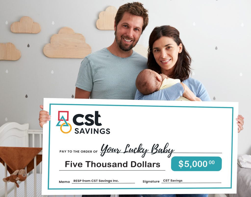 New parents with baby holding cheque for $5000