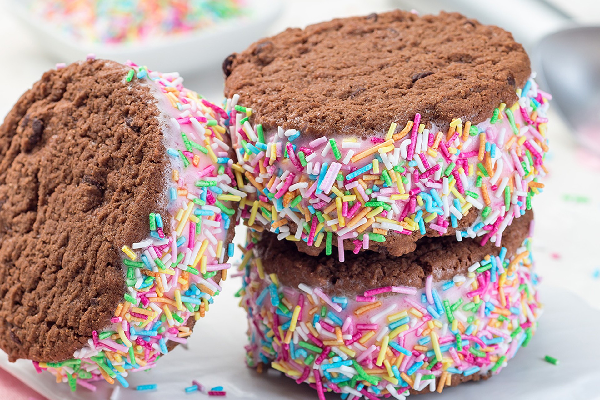 chocolate strawberry ice cream sandwiches with sprinkles
