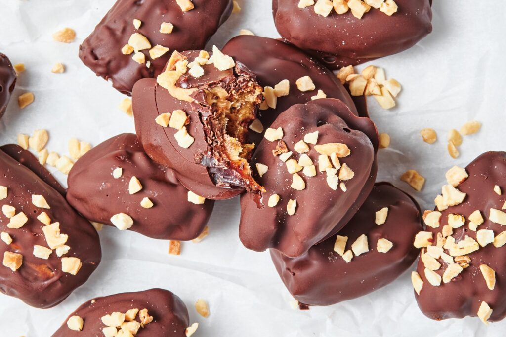 chocolate-covered Medjool dates with chopped peanuts